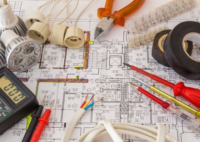 Still Life Of Electrical Components Arranged On Plans